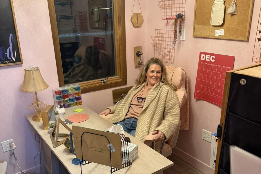 Kristy Roberts, Director and Owner of The Nest Child Care and Early Learning Center, in her office at the Earlham, Iowa center