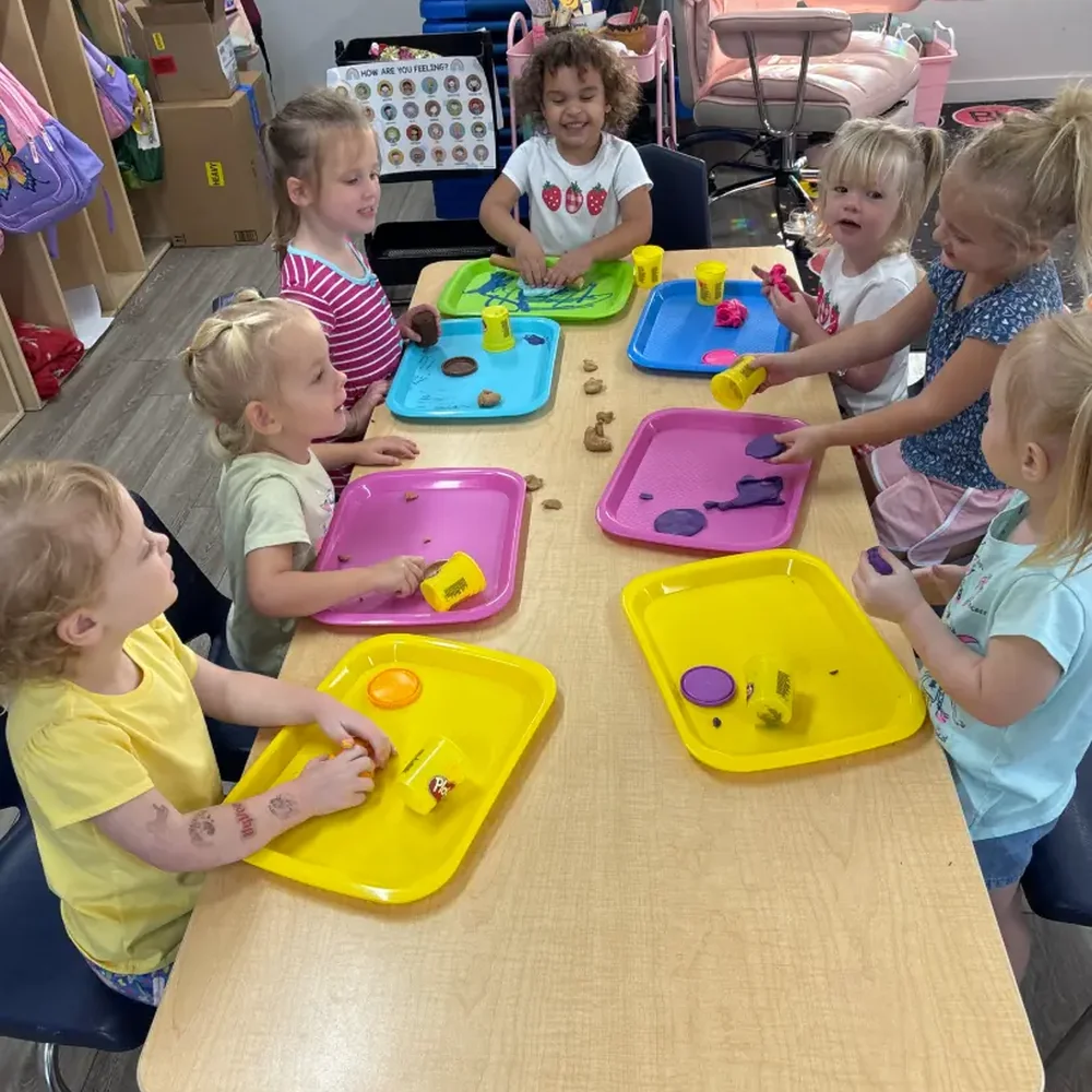 Half-day 3-year-old preschool class learning together at The Nest in Earlham, Iowa